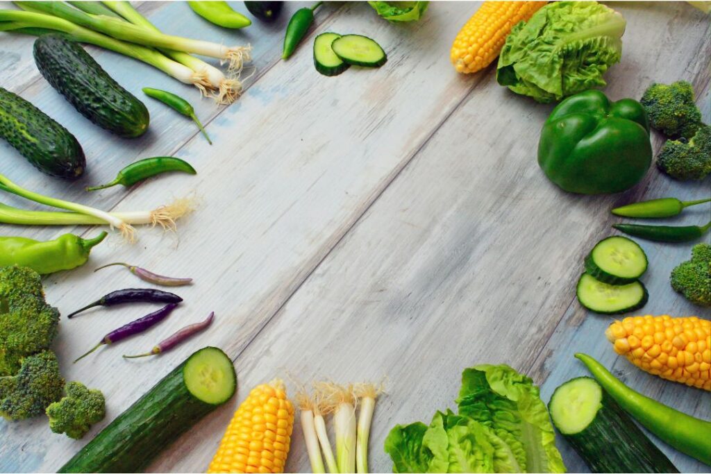 a selection of fresh vegetables laid out in a circle