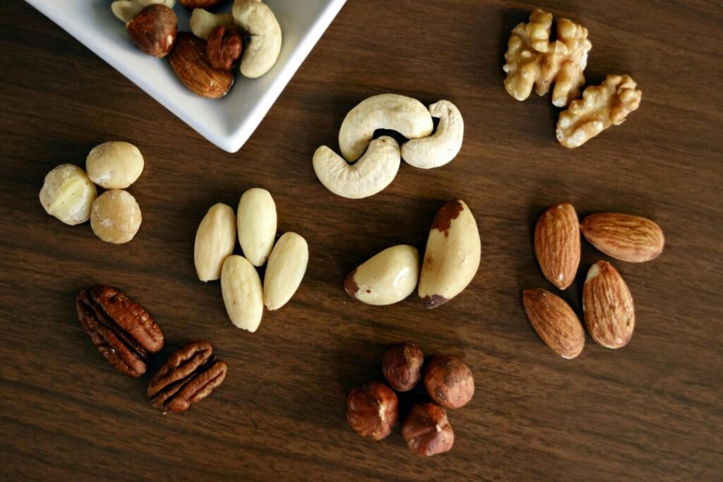 different types of nuts laid out in small piles