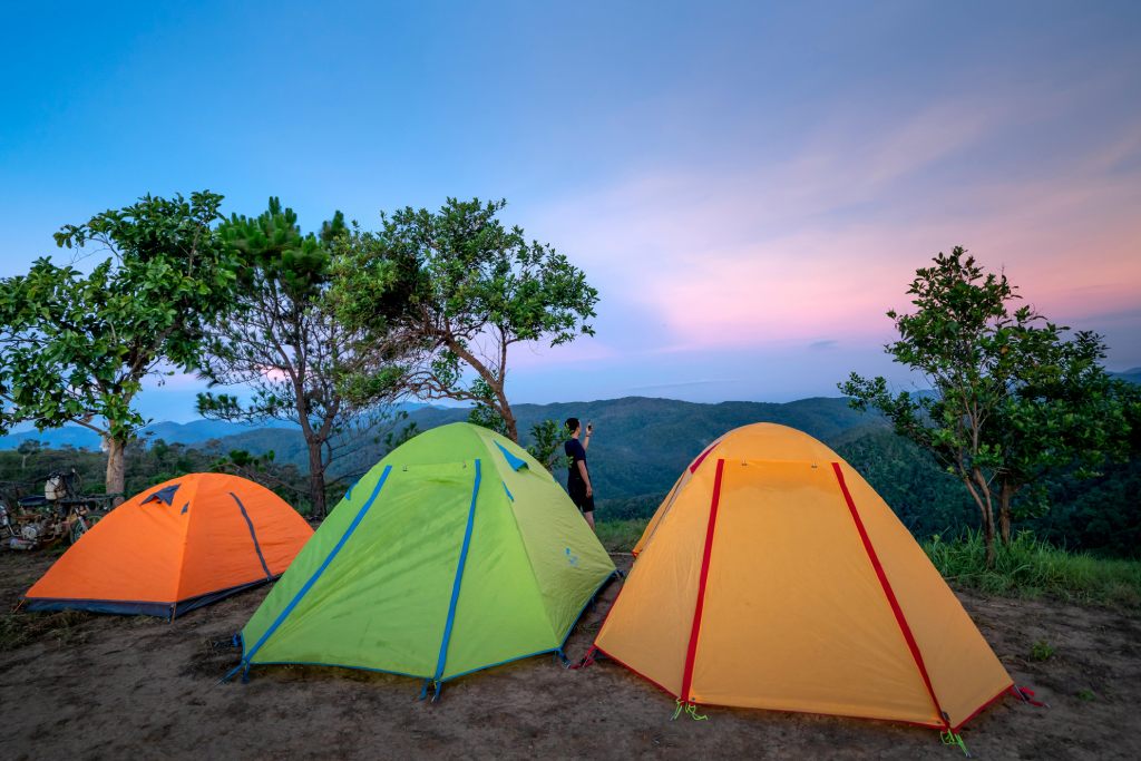 wellness travel with wild camping featuring 3 coloured tents