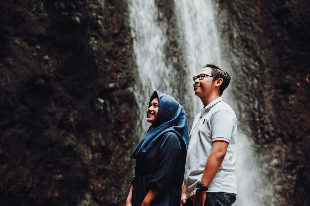 A man and a woman marvelling at nature