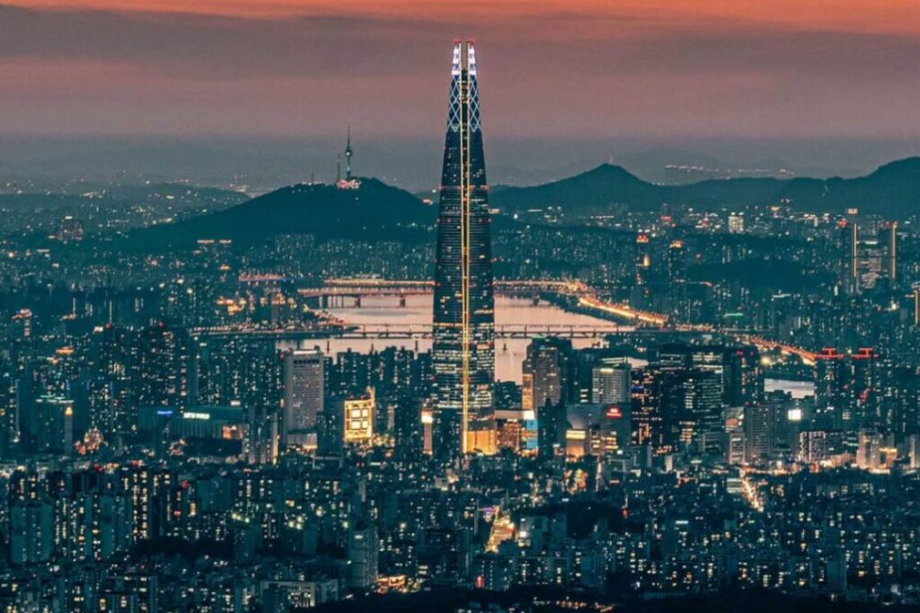 an Asian cityscape lit up at night